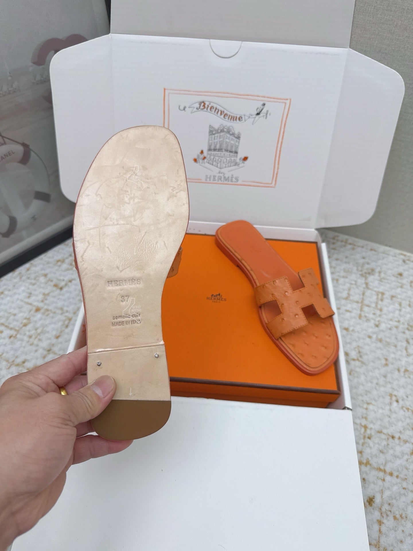 HM 26ss Oran Sandals Orange Ostrich Leather 625093
