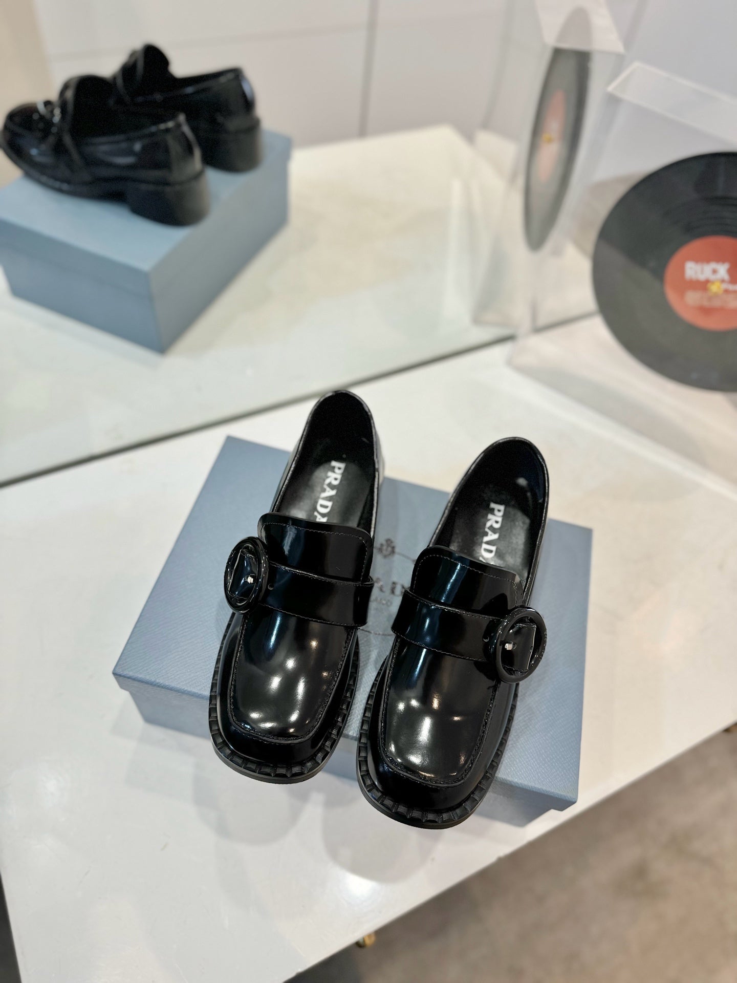 Prada 26s Heeled Loafers Black Brushed Leather 941519