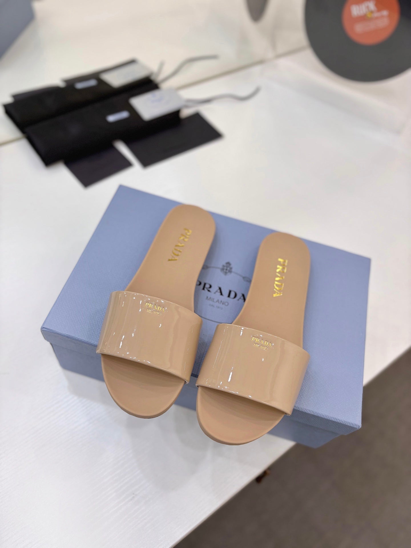 Prada Slides Beige Patent Leather 834595